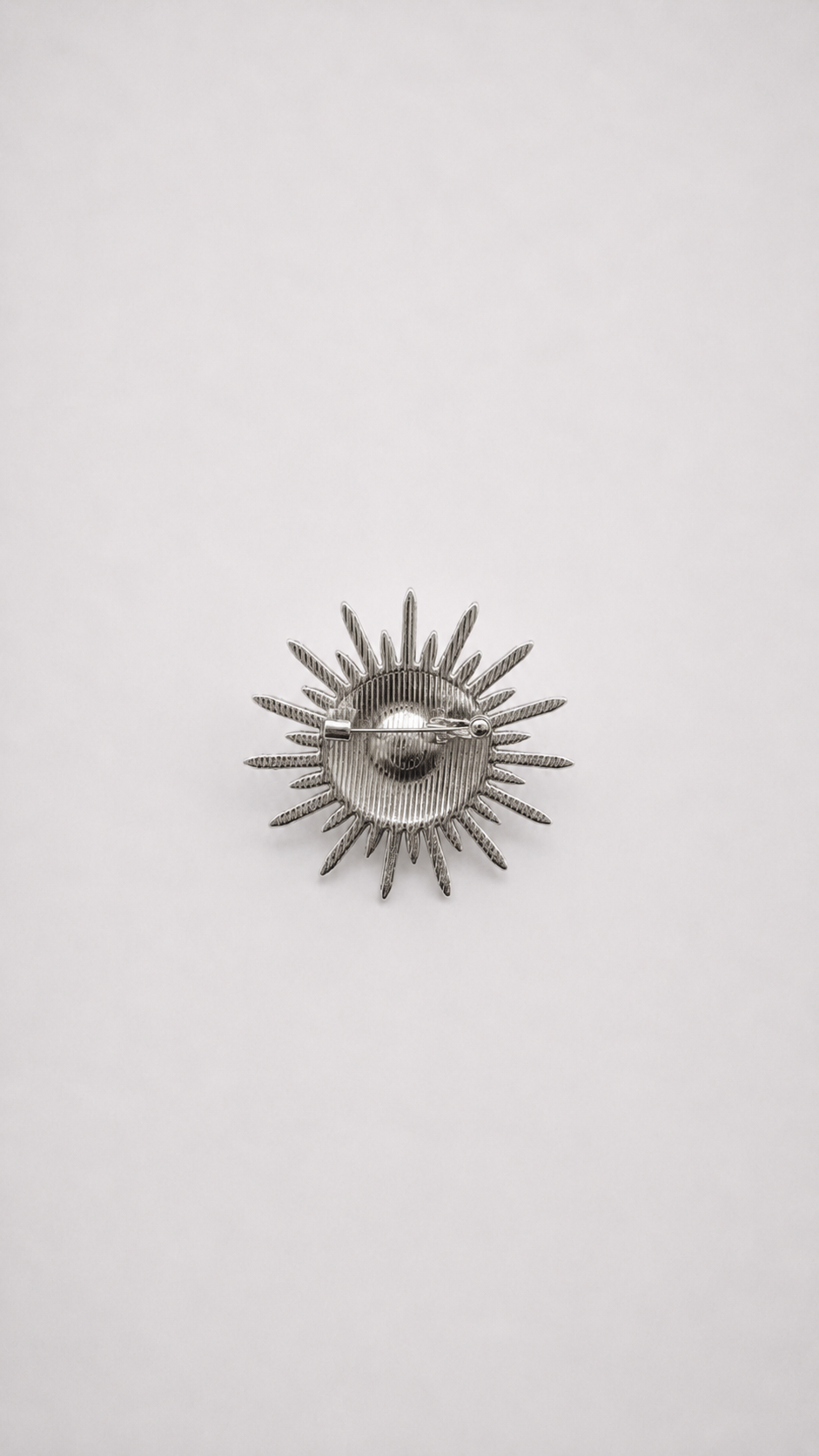QELOS Brooch