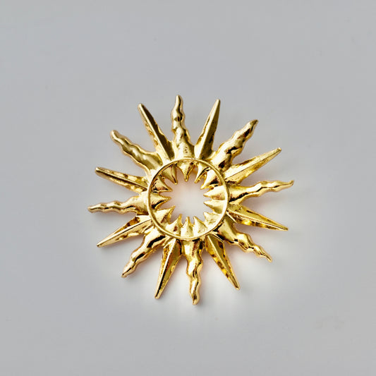 SUN brooch